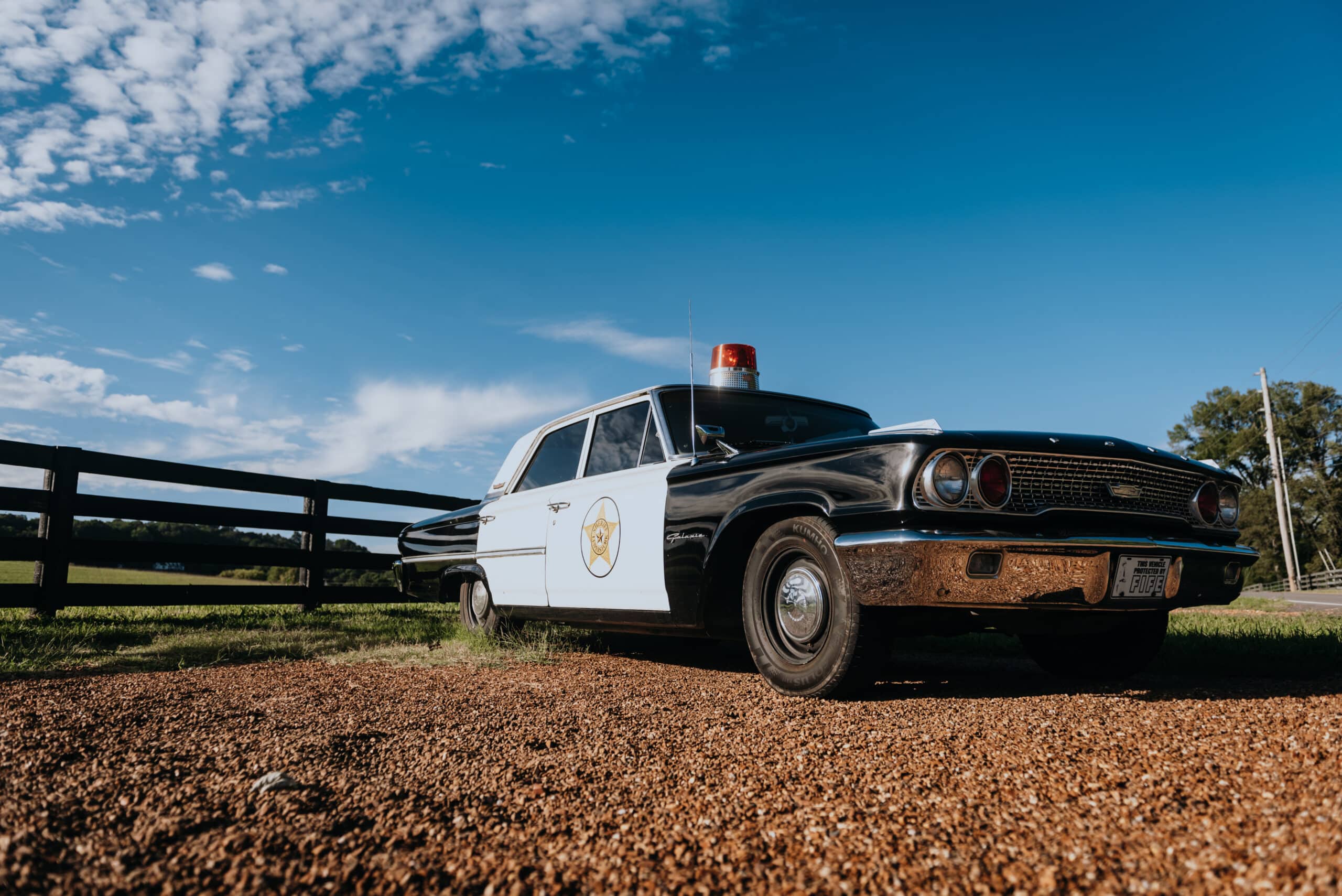 A replica of the squad car driven by Andy Griffith on the Andy Griffith Show greets visitors to the village of Leiper's Fork along Old Hillsboro Road just outside downtown Franklin, Tennessee. (Photo courtesy of Visit Franklin)