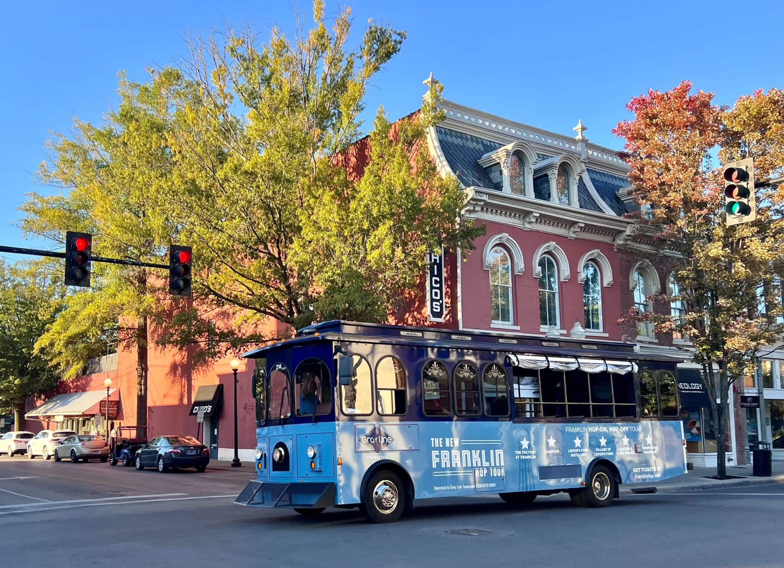 A Franklin Hop Trolly, operated by Gray Line Tennessee drives down Franklin’s iconic Main Street. Photo courtesy of VisitFranklin.com